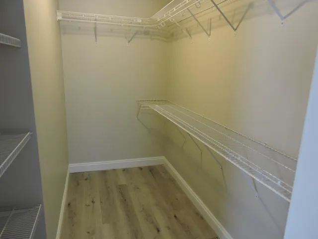 a view of a room with racks on the wall