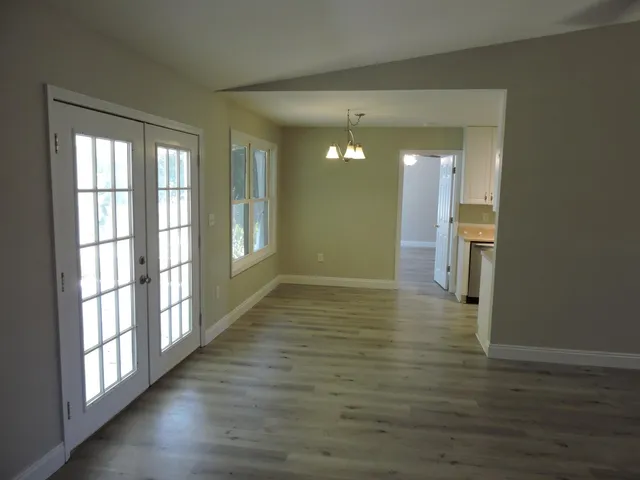 a view of an empty room and window