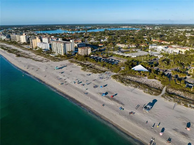 a view of a backyard with sitting area and slide