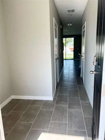 a view of gallery with windows