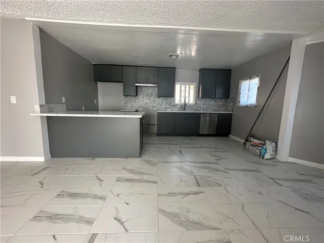 a living room with a couch and furniture