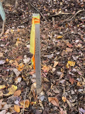 a sign board tall building