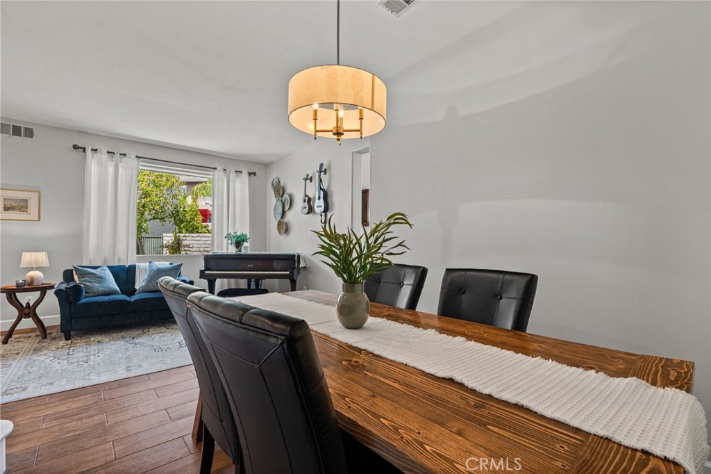 28356 Santa Rosa Lane Saugus, CA 91350 - Photo 28 of 50 a bedroom with a bed and a chandelier
