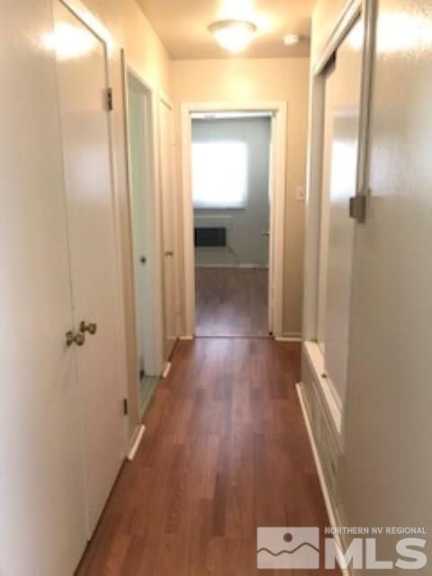 745-747 Apple Street Reno, NV 89502 - Photo 11 of 19 a view of a hallway with wooden floor
