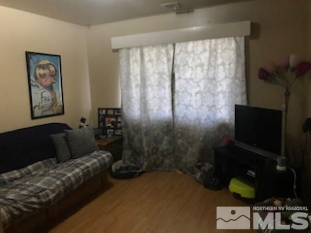 745-747 Apple Street Reno, NV 89502 - Photo 18 of 19 a living room with furniture and a flat screen tv