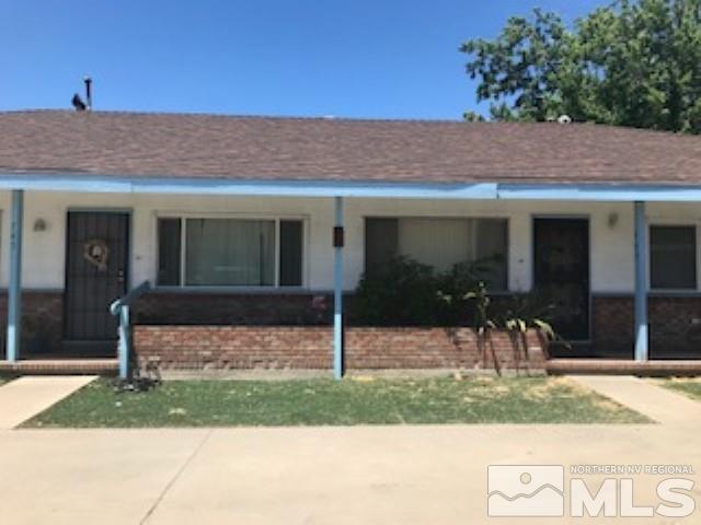 745-747 Apple Street Reno, NV 89502 - Photo 3 of 19 a view of a house with backyard and porch