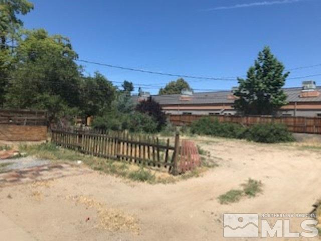 745-747 Apple Street Reno, NV 89502 - Photo 6 of 19 a view of a yard with wooden fence