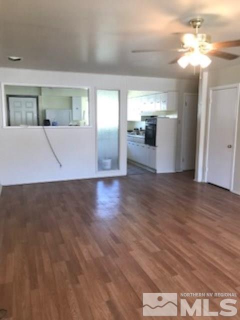 745-747 Apple Street Reno, NV 89502 - Photo 7 of 19 a view interior of a house a kitchen wooden floor and a chandelier