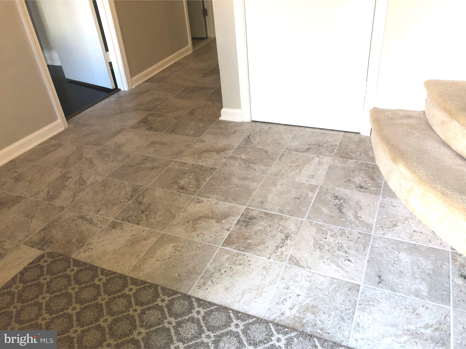 7911 Richfield Road Springfield, VA 22153 - Photo 2 of 40 NEW Ceramic Tile Flooring in large Entry Foyer