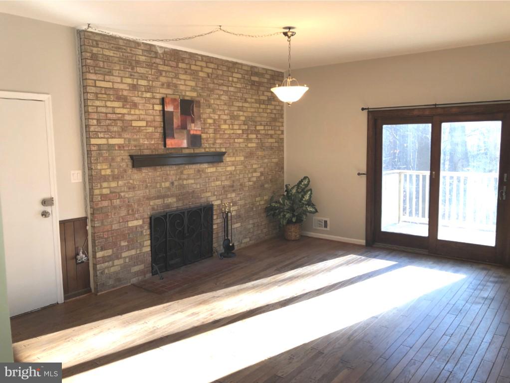 7911 Richfield Road Springfield, VA 22153 - Photo 11 of 40 Family Room Brick Fireplace with Mantle