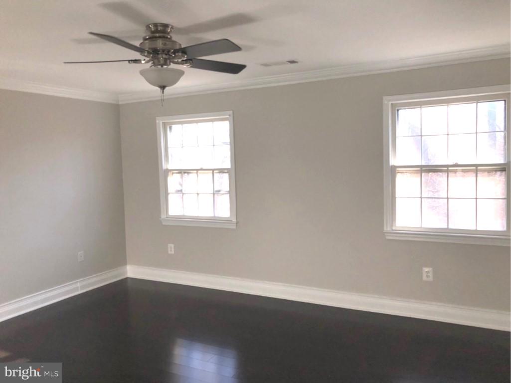 7911 Richfield Road Springfield, VA 22153 - Photo 22 of 40 Spacious Master Bedroom with Ceiling Fan