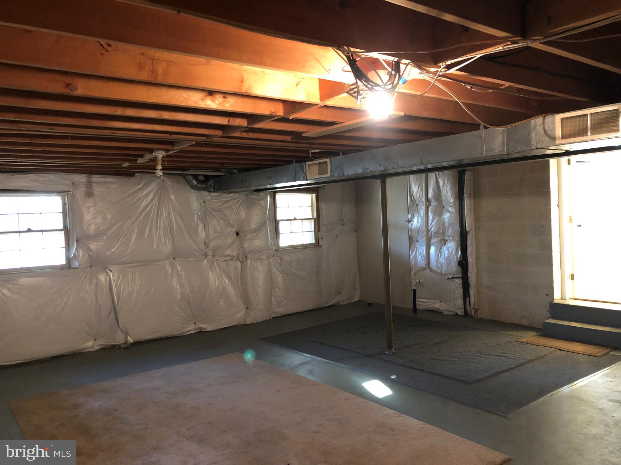 7911 Richfield Road Springfield, VA 22153 - Photo 35 of 40 Unfinished Lower Level 2 with R.I. Plumbing