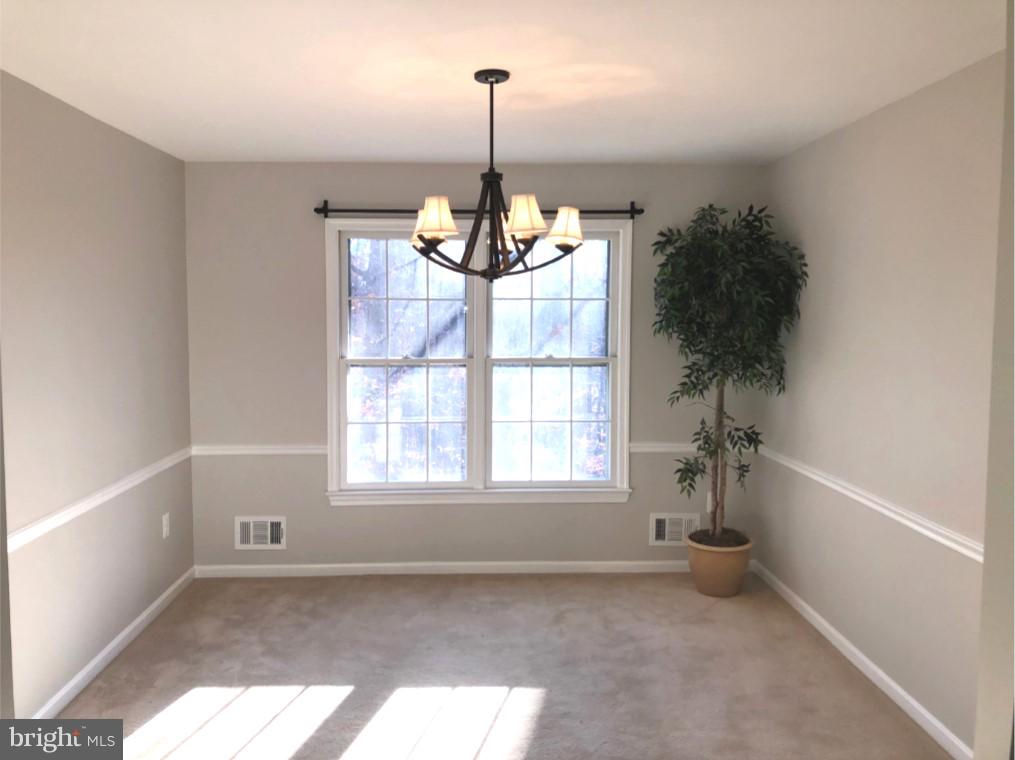7911 Richfield Road Springfield, VA 22153 - Photo 6 of 40 Sunny Dining Room with Chair-Railing