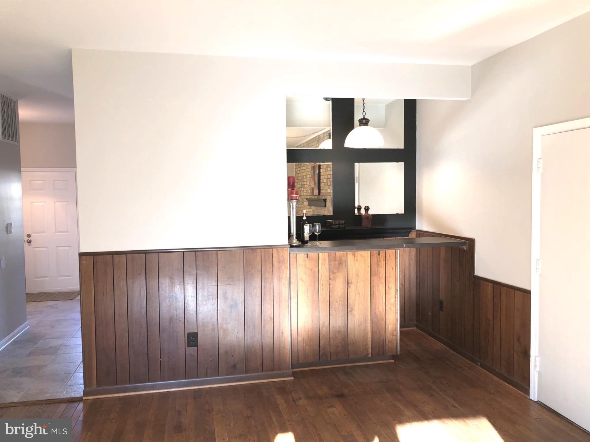 7911 Richfield Road Springfield, VA 22153 - Photo 10 of 40 Step-Down Family Room with Wet Bar