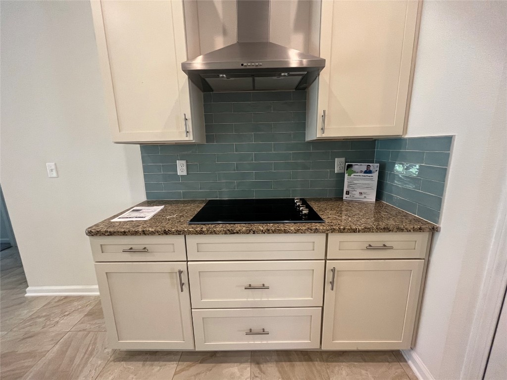 96754 Quartz Lane Yulee, FL 32097 - Photo 12 of 23 a stove top oven sitting inside of a kitchen