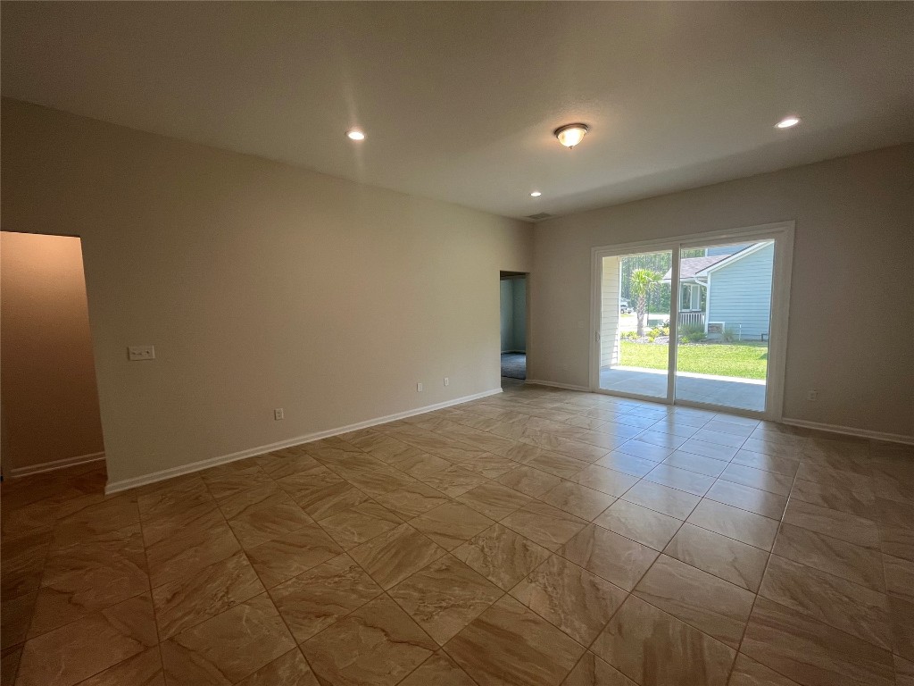 96754 Quartz Lane Yulee, FL 32097 - Photo 15 of 23 a view of an empty room with a window