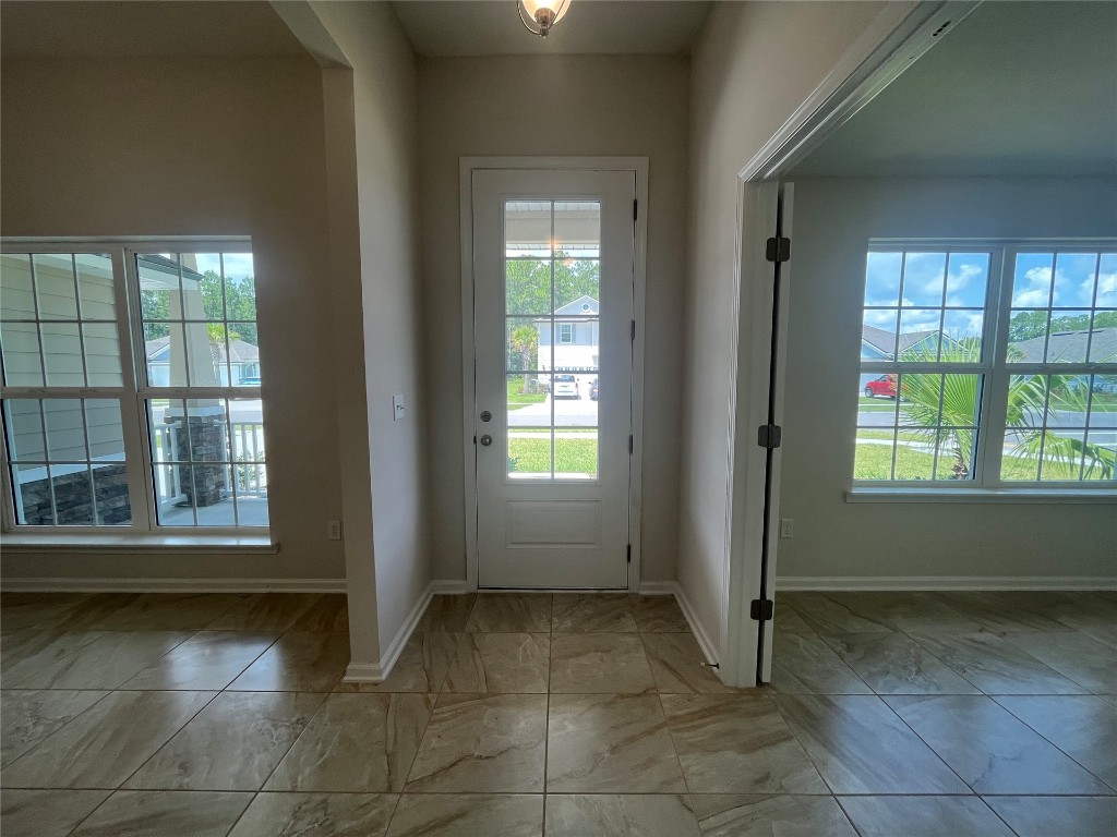 96754 Quartz Lane Yulee, FL 32097 - Photo 7 of 23 a view of an empty room with a window