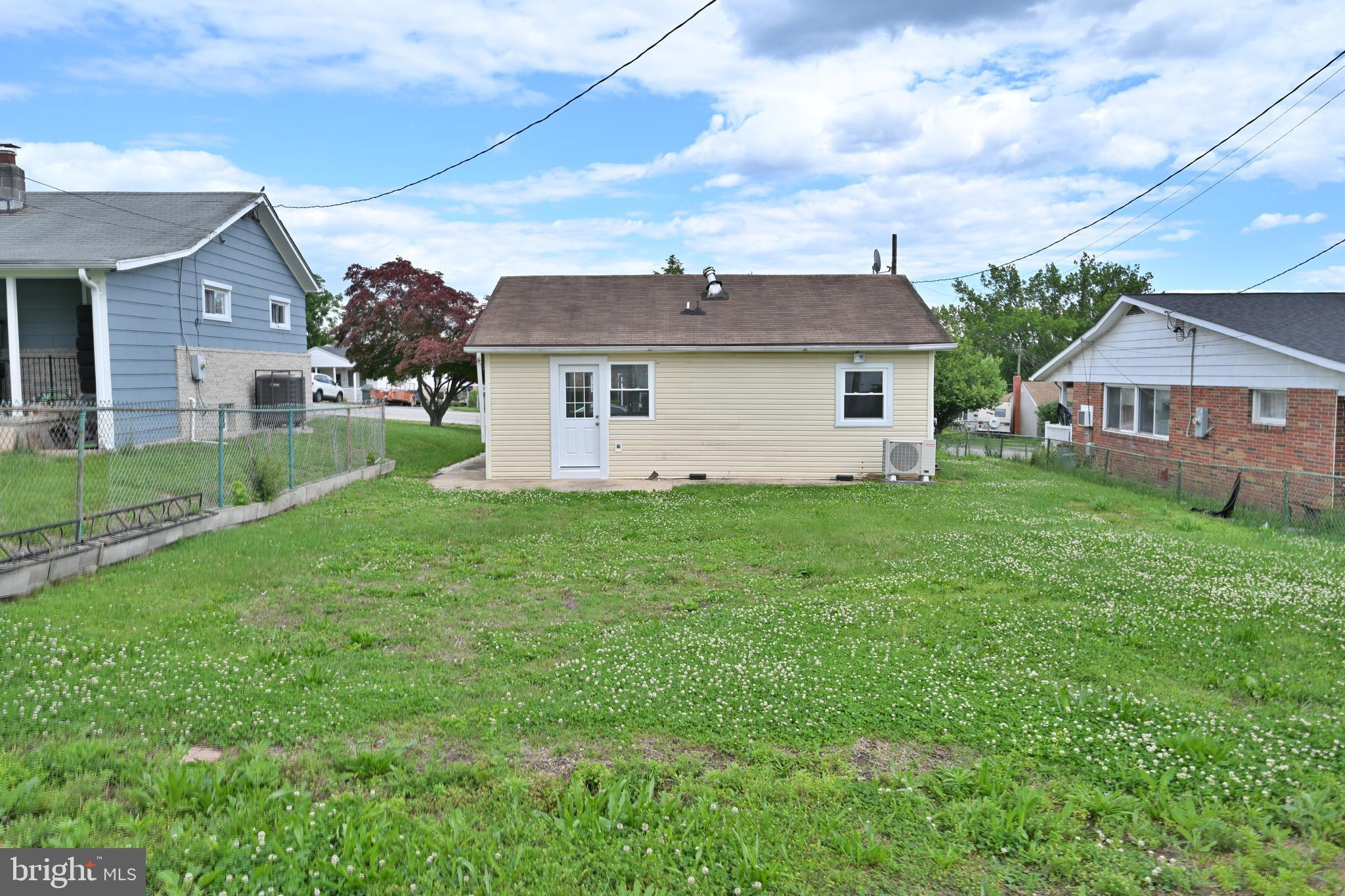 34 Compass Road East Middle River, MD 21220 - Photo 2 of 25 a front view of house with yard and green space