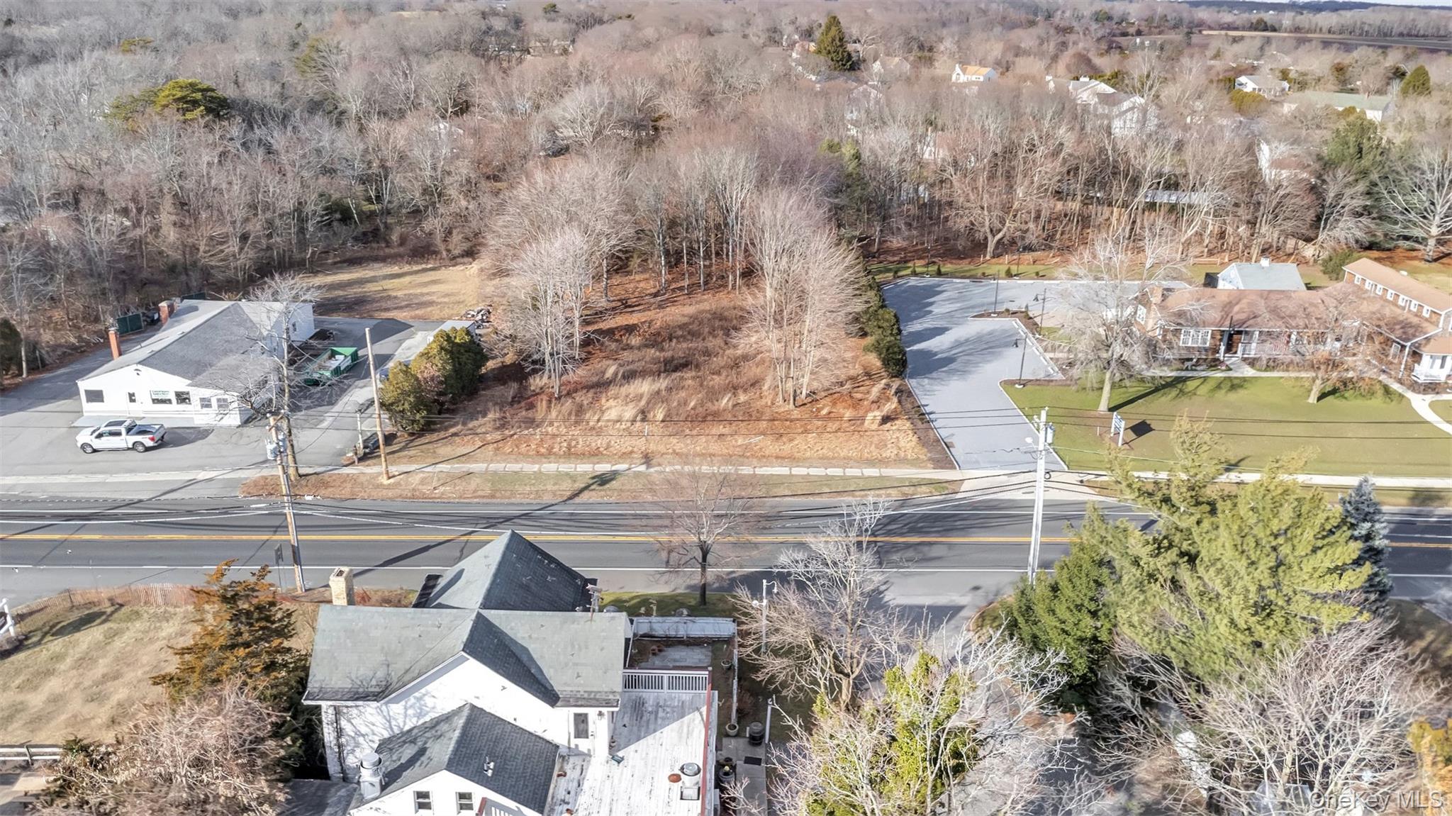 Undisclosed Address Aquebogue, NY 11931 - Photo 12 of 15 a view of swimming pool with a yard and seating area