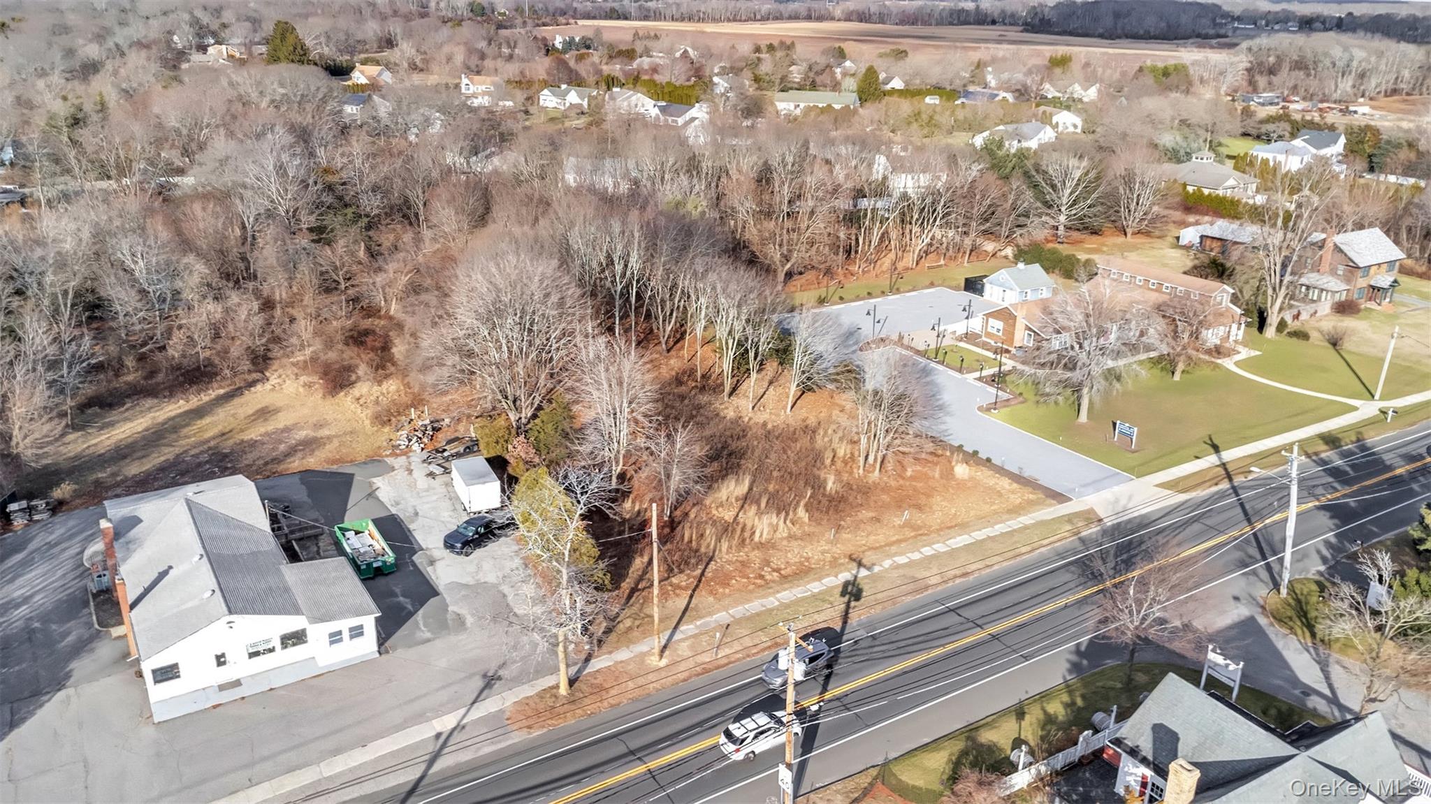 Undisclosed Address Aquebogue, NY 11931 - Photo 2 of 15 a view of roof with wooden floor