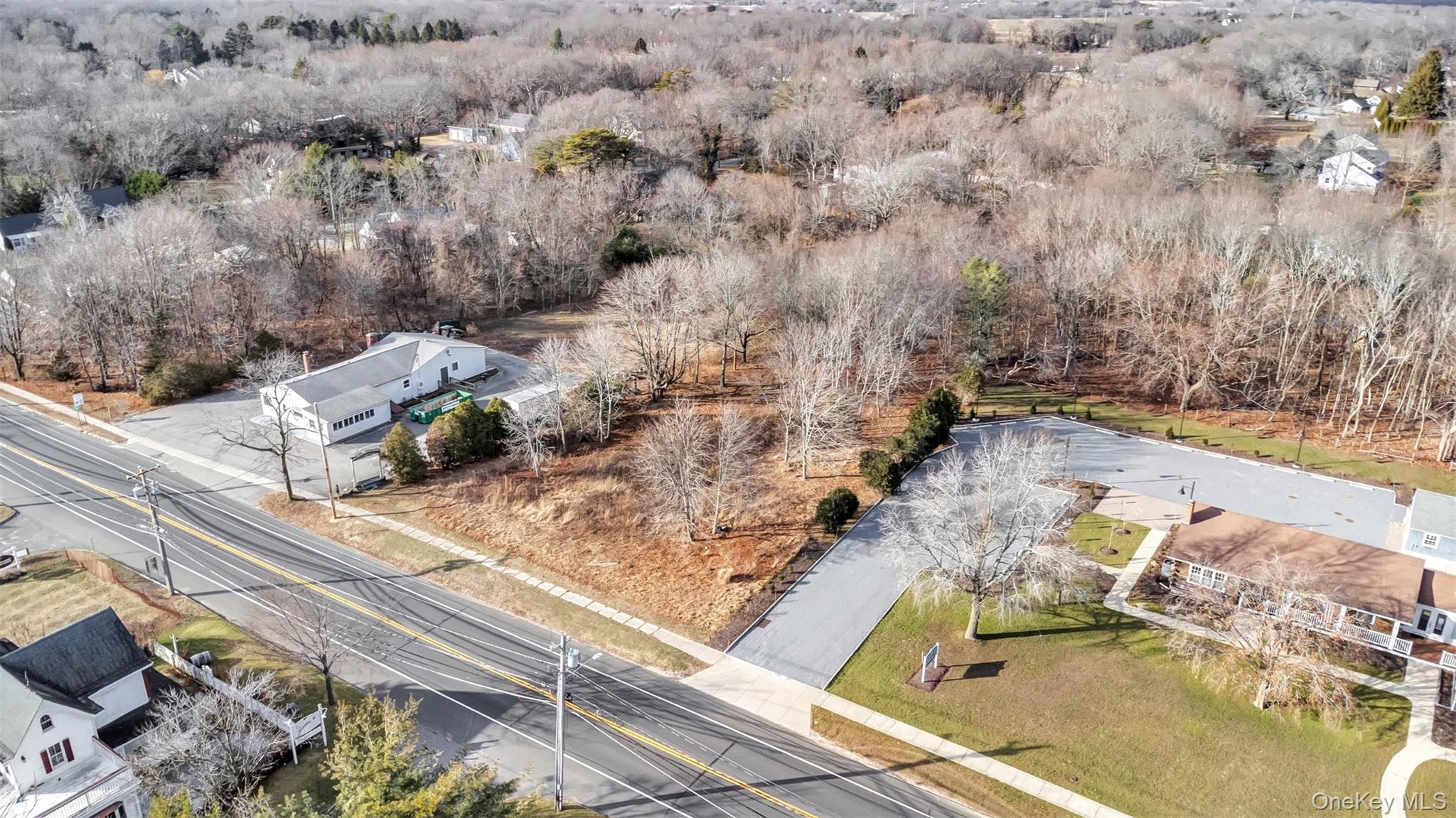 Undisclosed Address Aquebogue, NY 11931 - Photo 10 of 15 a view of a backyard of a house