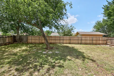 a view of backyard with green space