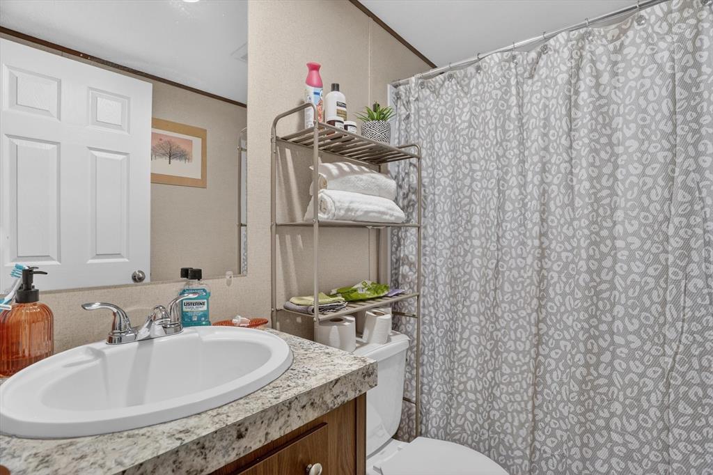 9705 Nolan Rnch Loop Godley, TX 76044 - Photo 25 of 40 comfortable space in second bathroom