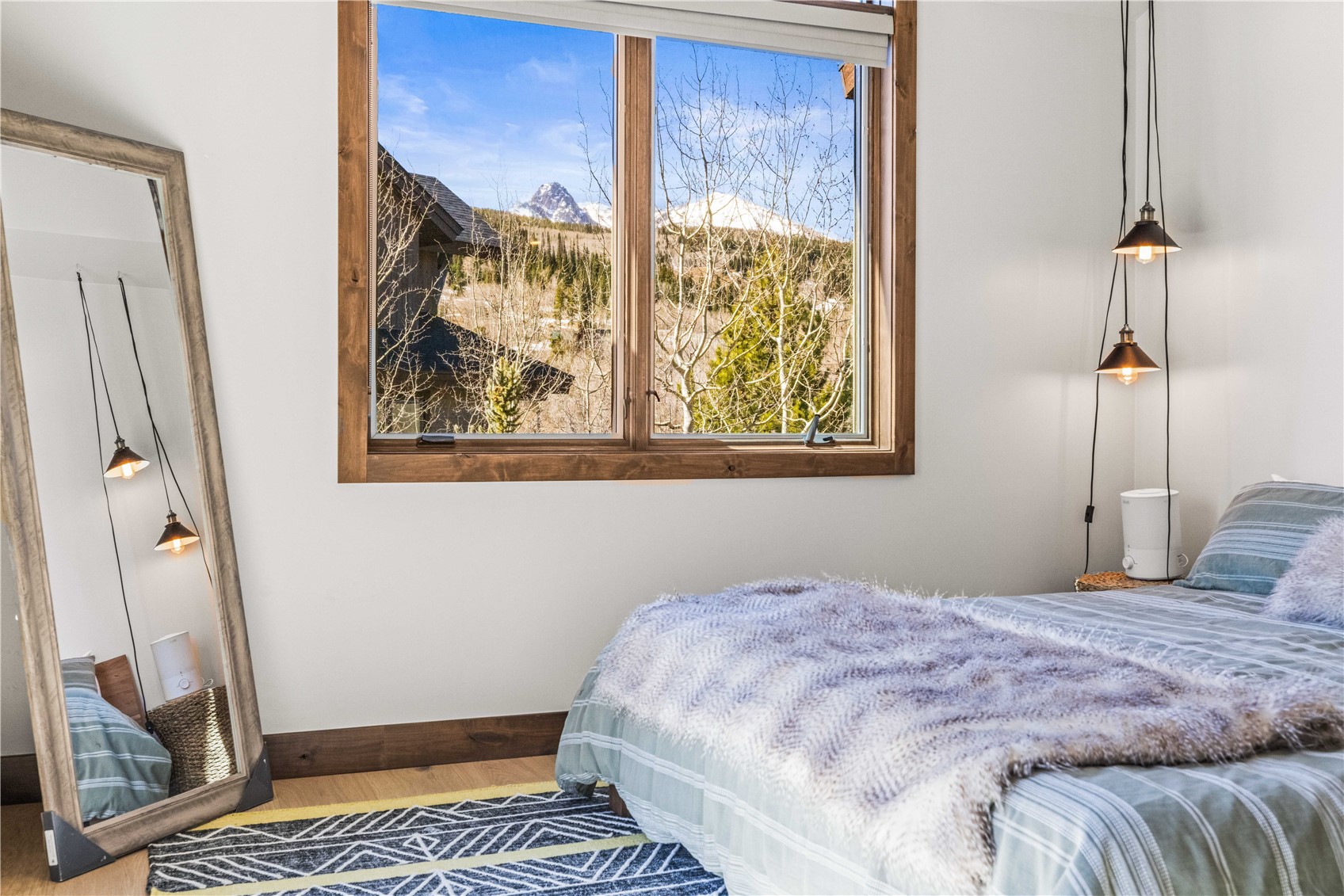 230 Game Trail Road Silverthorne, CO 80498 - Photo 40 of 43 a bedroom with a bed and a window