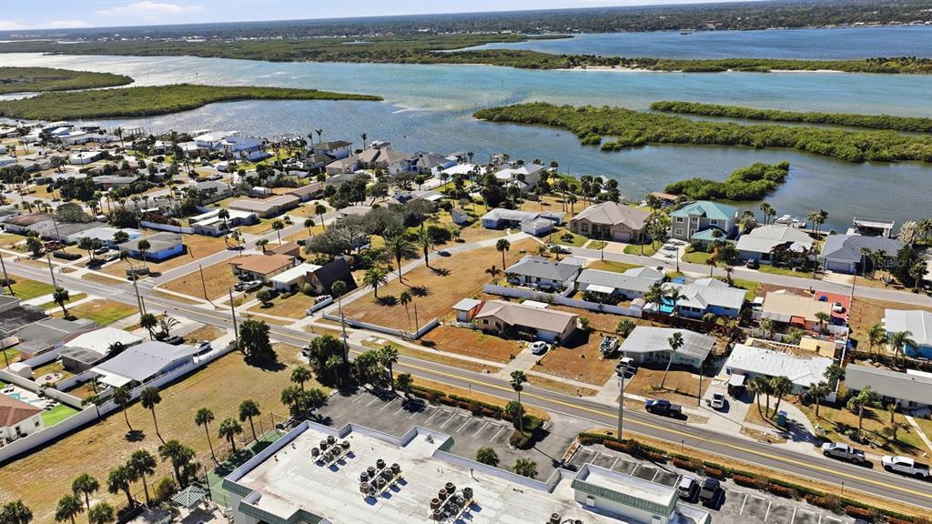 3816 Cardinal Boulevard Port Orange, FL 32127 - Photo 21 of 42 an aerial view of a city with lake view