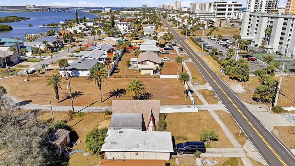 3816 Cardinal Boulevard Port Orange, FL 32127 - Photo 24 of 42 an aerial view of residential houses with yard