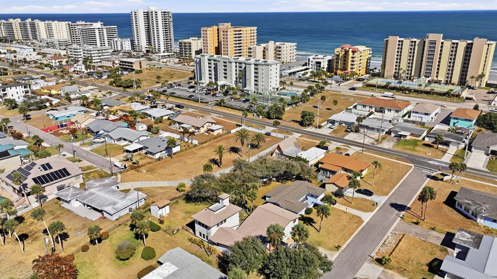 3816 Cardinal Boulevard Port Orange, FL 32127 - Photo 34 of 42 an aerial view of residential building with parking space