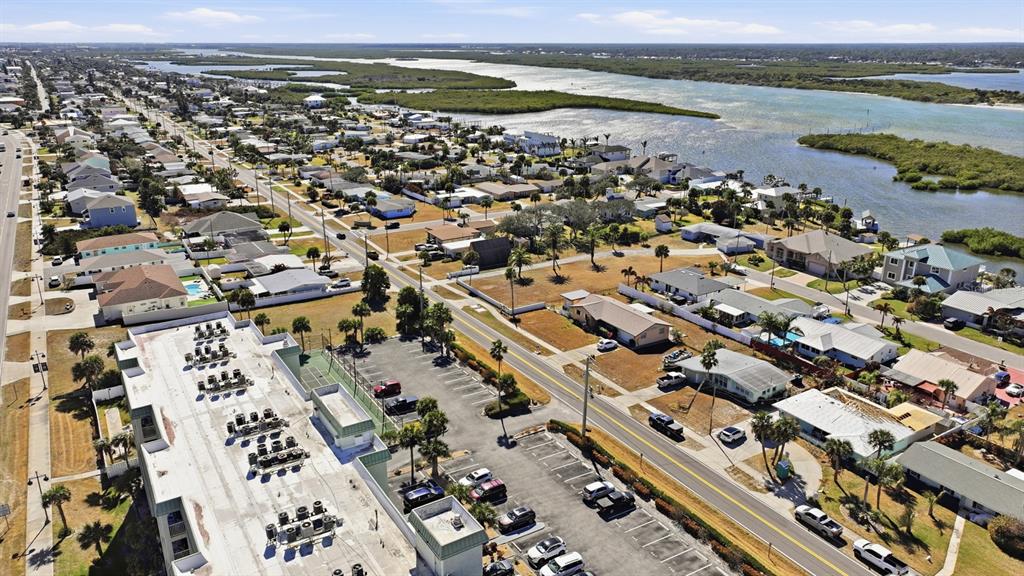 3816 Cardinal Boulevard Port Orange, FL 32127 - Photo 38 of 42 an aerial view of a city with lake view