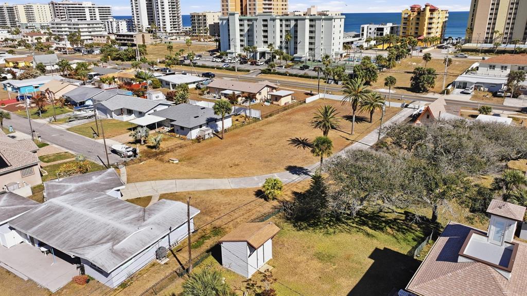 3816 Cardinal Boulevard Port Orange, FL 32127 - Photo 5 of 42 an aerial view of a city with ocean view