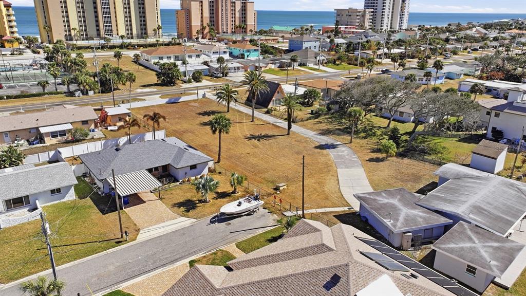 3816 Cardinal Boulevard Port Orange, FL 32127 - Photo 6 of 42 an aerial view of a city with lots of residential buildings