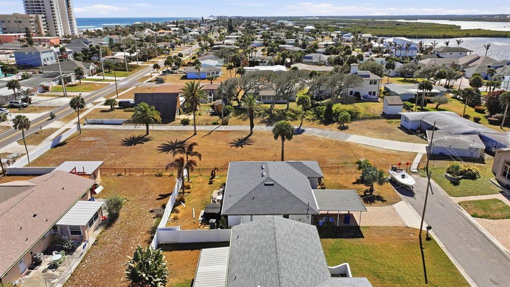 3816 Cardinal Boulevard Port Orange, FL 32127 - Photo 7 of 42 an aerial view of a city with lots of residential buildings