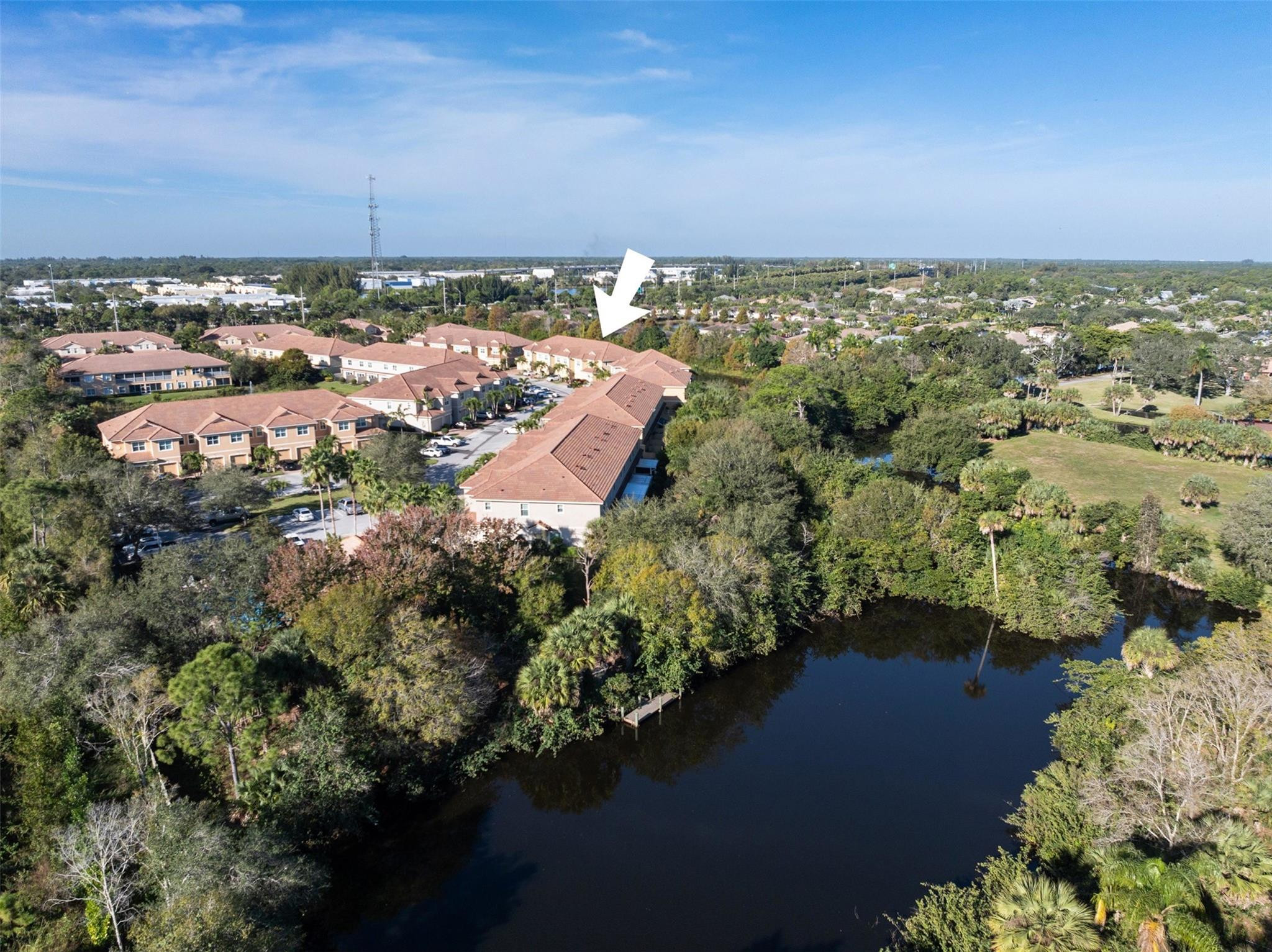 651 Southwest Glen Crest Way, Unit 2 Stuart, FL 34997 - Photo 32 of 41 an aerial view of a house with a yard