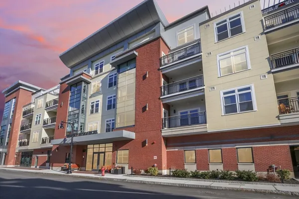 a front view of a building with street view