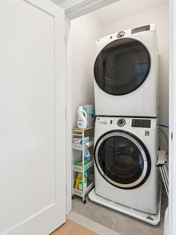 62 Foundry Street, Unit 204 Wakefield, MA 01880 - Photo 15 of 28 a utility room with dryer and washer