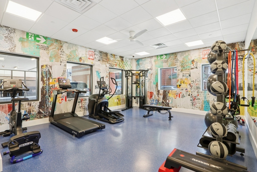 62 Foundry Street, Unit 204 Wakefield, MA 01880 - Photo 23 of 28 a view of a room with gym equipment