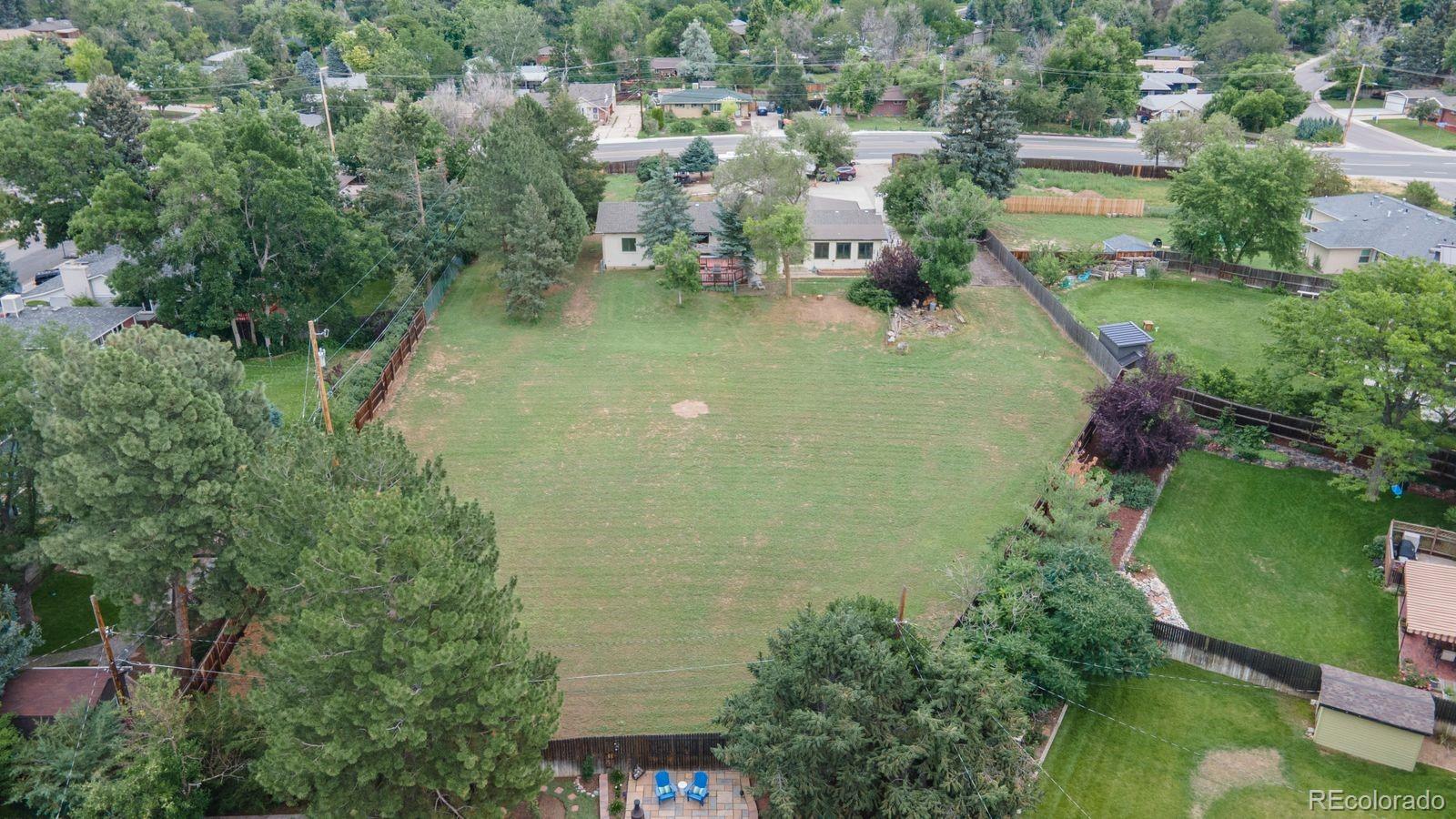 6101 South University Boulevard Centennial, CO 80121 - Photo 24 of 38 an aerial view of residential houses with outdoor space and trees