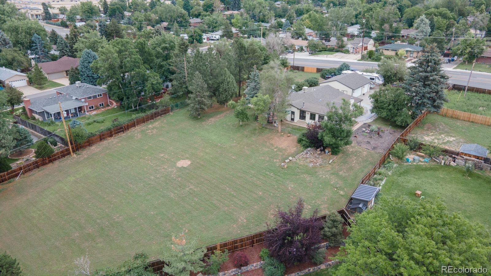 6101 South University Boulevard Centennial, CO 80121 - Photo 32 of 38 an aerial view of a house with a yard