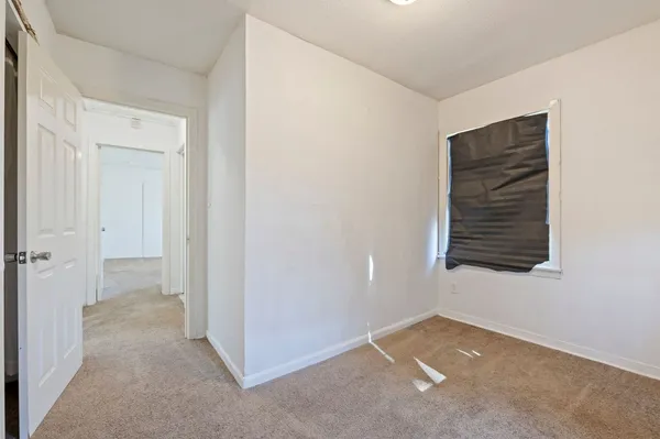 an empty room with windows