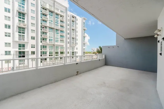 a view of a dining room with furniture water and chandelier
