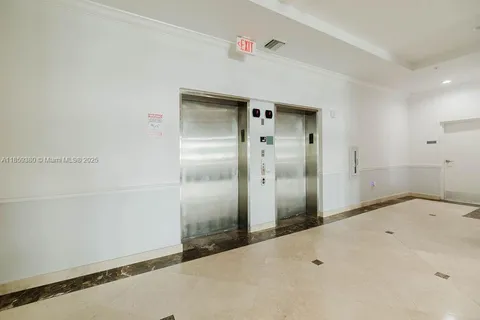 a view of a house with a small yard