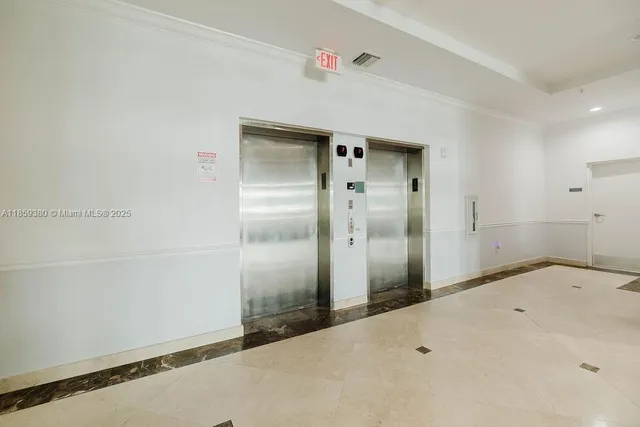 a view of a house with a small yard