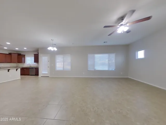 a view of a livingroom and a kitchen