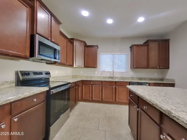 a view of kitchen and a window