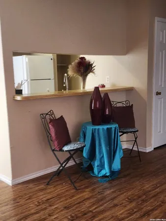 a view of workspace and wooden floor