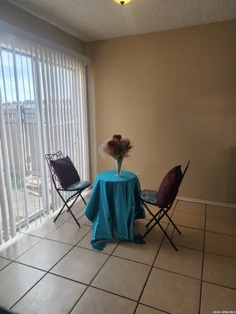 a view of a workspace with furniture