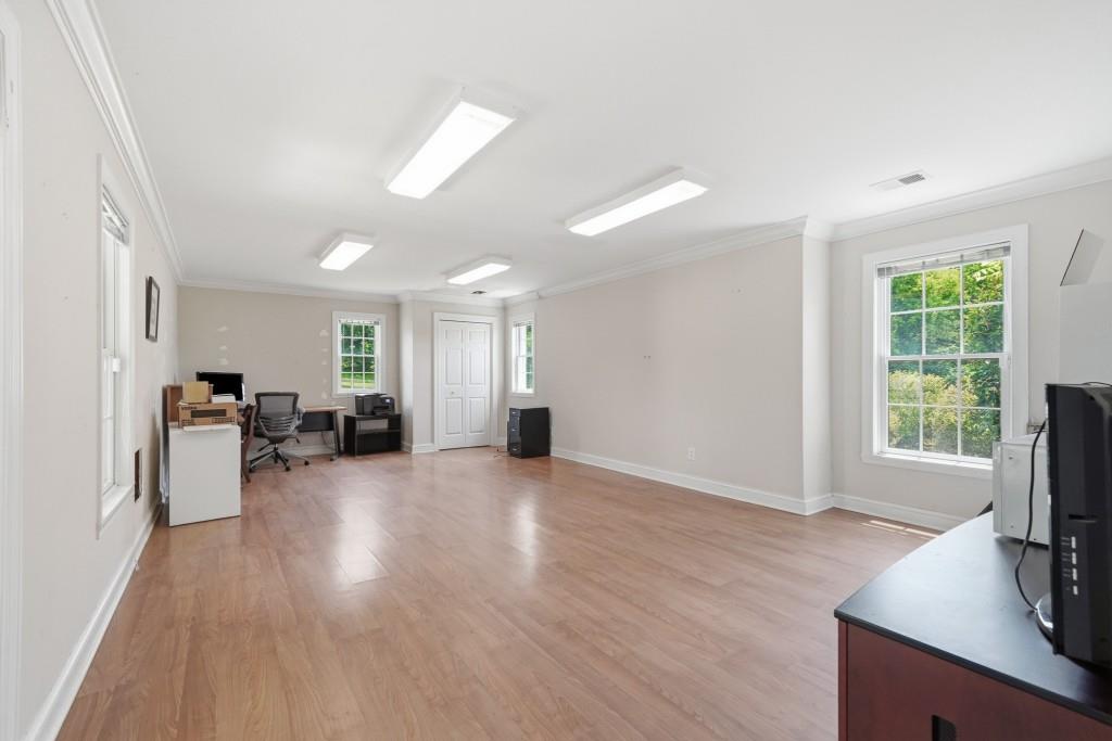 774 Bray Road Southwest Calhoun, GA 30701 - Photo 52 of 106 a view of a livingroom with workspace and a window